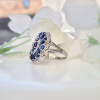 Feminine Elegance With Statement – Couture-Style Oval Sapphire Wedding Ring