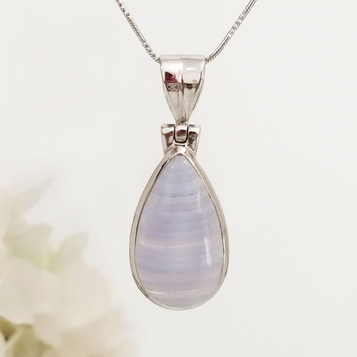 Blue Lace Agate Pendant in high quality silver ready available at Nafisa Designs, Manchester UK. Free Global Shipping!
For Inquiries Call or WhatsApp: +447878581702 OR +96567725075