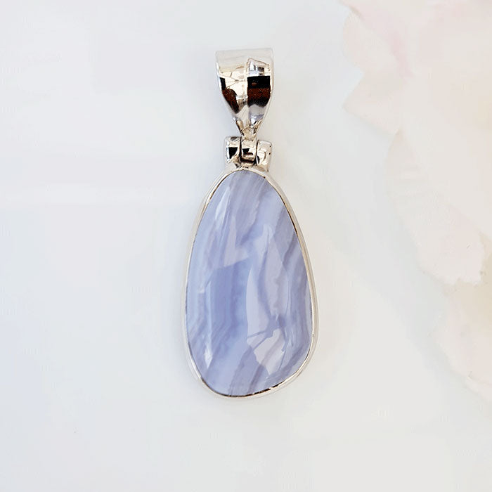 Blue Agate Pendant made in high-quality Silver ready available at Nafisa Designs. Manchester, UK. Free Global Shipping!