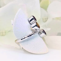 Perspective view of the Crimson Sunburst Ring