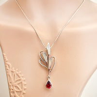 Pear Shape Garnet Pendant made in 925 Silver by Nafisa Designs. Manchester UK. Free Global Shipping!