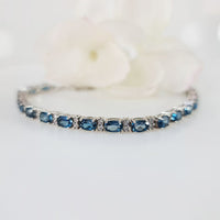 Mystic Blue Symphony Bracelet  in real natural original London Blue Topaz in 925 silver for birthstone, party, or casual wear. lightweight, delicate, dainty designer jewellery.