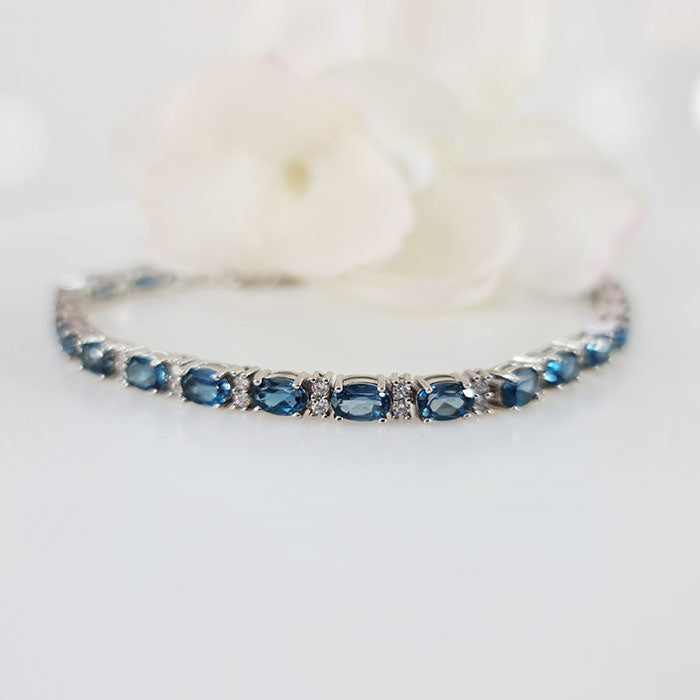 Mystic Blue Symphony Bracelet  in real natural original London Blue Topaz in 925 silver for birthstone, party, or casual wear. lightweight, delicate, dainty designer jewellery.