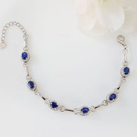 Interlock Wisdom Bracelet in real natural original Blue Sapphire in 925 silver for birthstone, party, or casual wear. lightweight, delicate, dainty designer jewellery.