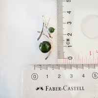 The prehnite pendant is made of 925 silver by Nafisa Designs. Manchester UK. Free Global Shipping!