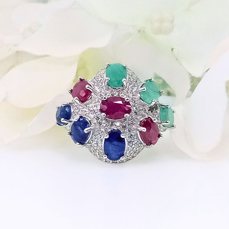Triad of Elegance ring featuring sapphire, ruby, and emerald gemstones in a high-quality sterling silver round design, symbolizing wisdom, passion, and growth.