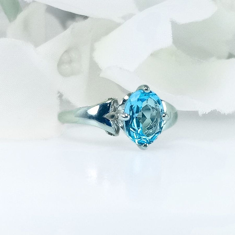 showcasing its elegant and bold design with the vibrant blue Topaz