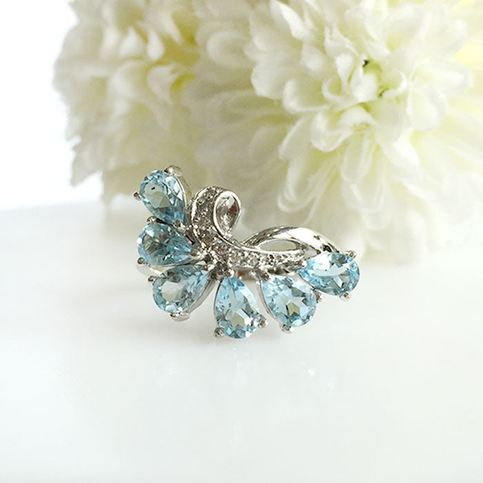 Clutch Topaz Ring