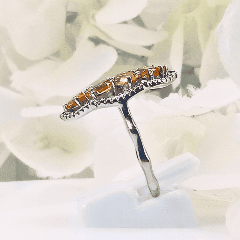 showcasing the radiant glow of the citrine gemstones set in a silver band