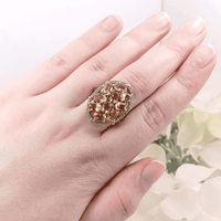 showcasing the elegant silver band and the vibrant oval citrine gemstones