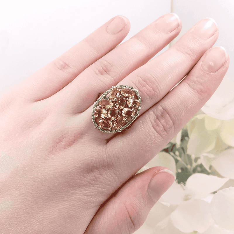 showcasing the elegant silver band and the vibrant oval citrine gemstones