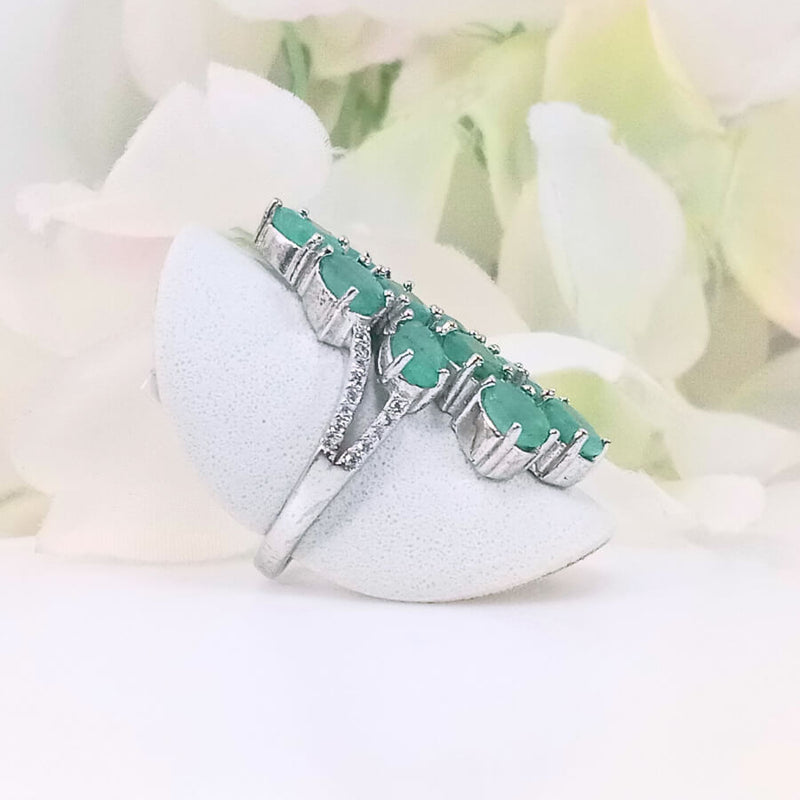 featuring a group of verdant green gems