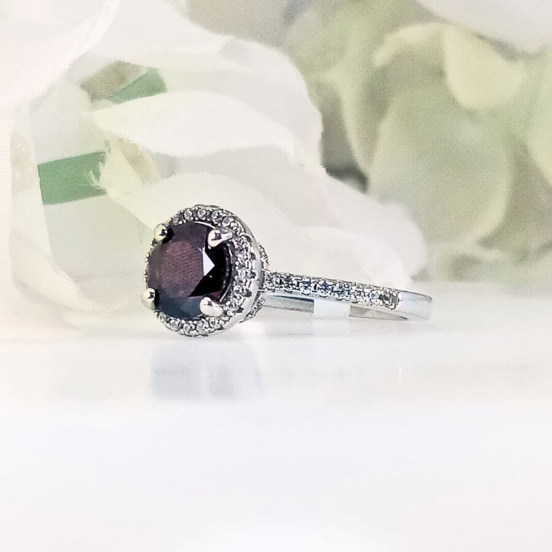 Front view of Women's Scarlet Passion Deep Red Garnet Ring in 925 Sterling Silver featuring a round crimson garnet gem in a sleek