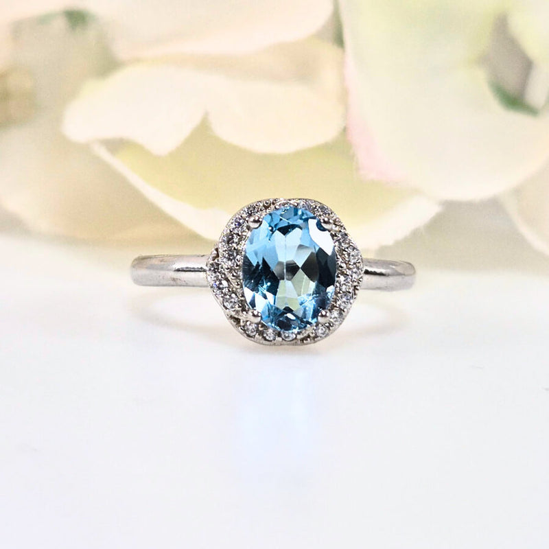 Authentic 925 sterling silver topaz ring for women, featuring a bright blue gemstone. High-quality, original design symbolizing wisdom and healing. Perfect for weddings, parties, and as a November birthstone gift
