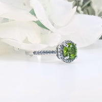 Perspective view of the Lush Lime Peridot Ring