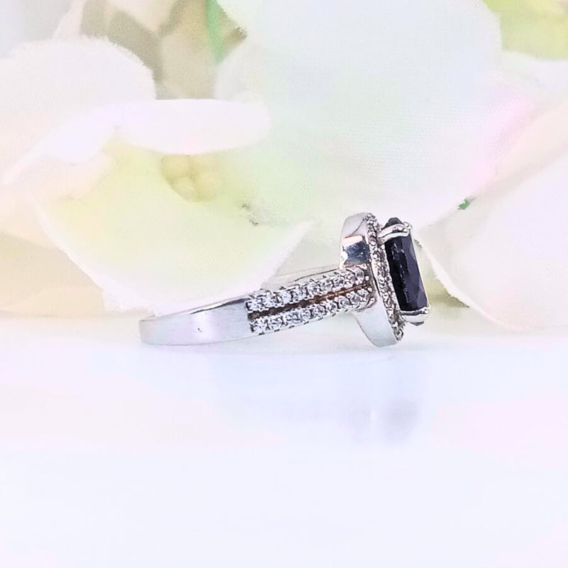 featuring a deep red gemstone. High-quality