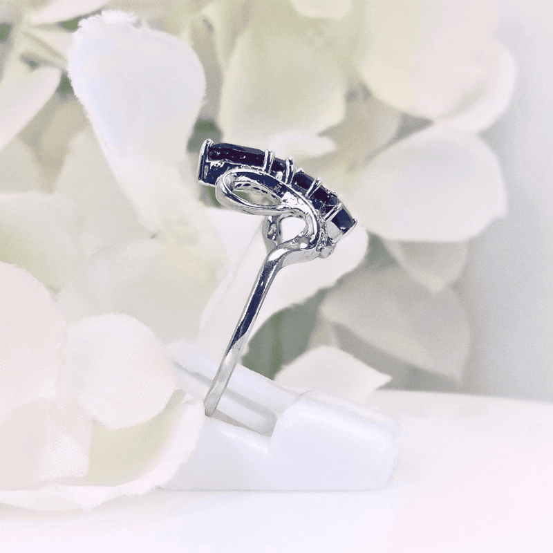 set in an intricately detailed silver band