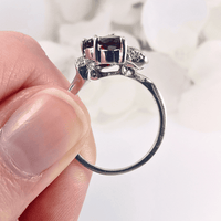 capturing the beautiful flow of the garnets and the detailed silver band