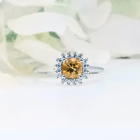 Front view of yellow citrine women’s ring in high-quality 925 sterling silver, showcasing the vibrant gemstone and sleek band design
