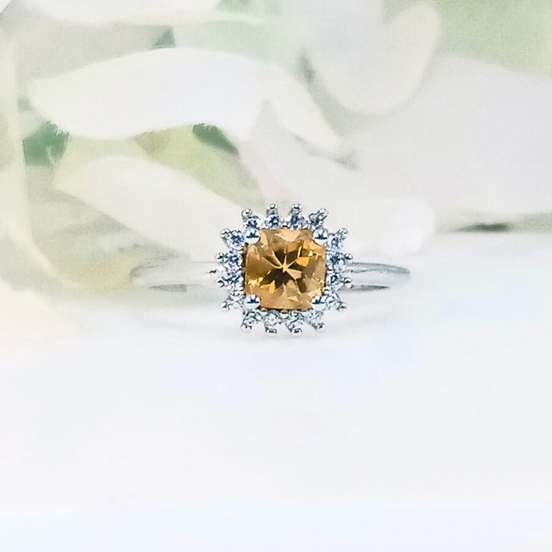 Front view of yellow citrine women’s ring in high-quality 925 sterling silver, showcasing the vibrant gemstone and sleek band design