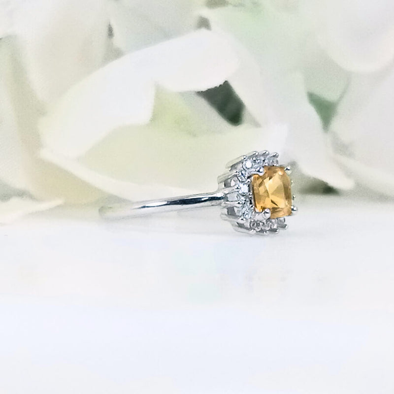 showcasing the vibrant gemstone and sleek band design
