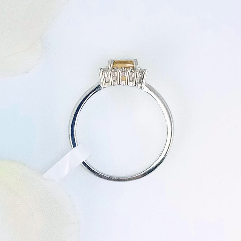 Perspective view of yellow citrine ring in 925 sterling silver