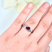 captured from a perspective view to highlight its elegant design and gemstone depth. Symbolizing passion