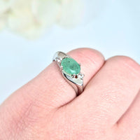 captured from a perspective view to highlight its elegant design and gemstone depth. A symbol of prosperity and wisdom
