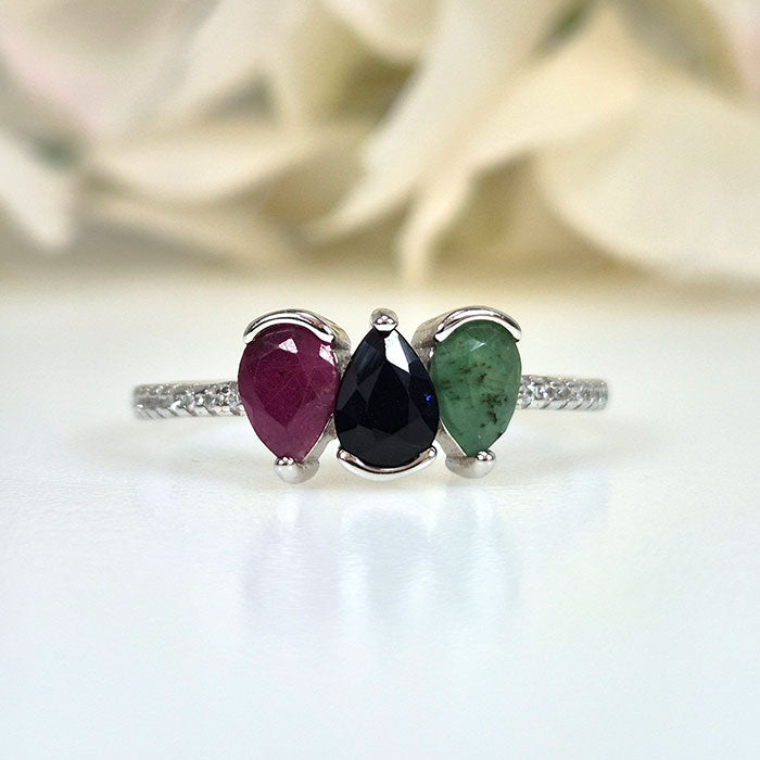 Royal Pear Trio Ring in original and authentic Topaz Emerald, Ruby, and Sapphire in 925 silver for birthstone, party, or casual wear. lightweight, delicate, dainty designer jewelry.