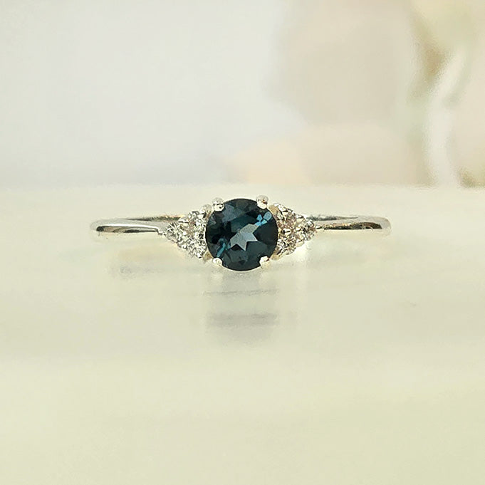 London's Topaz Symphony  in real natural original London Blue Topaz in 925 silver for birthstone, party, or casual wear. light weight, delicate, dainty designer jewellery