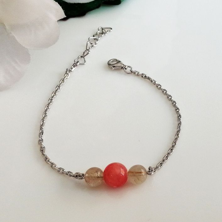 Rhodochrosite & Rutile Quartz Bracelet in high quality silver ready available at Nafisa Designs