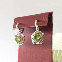 Peridot ring & earrings in high-quality silver are ready available at Nafisa Designs