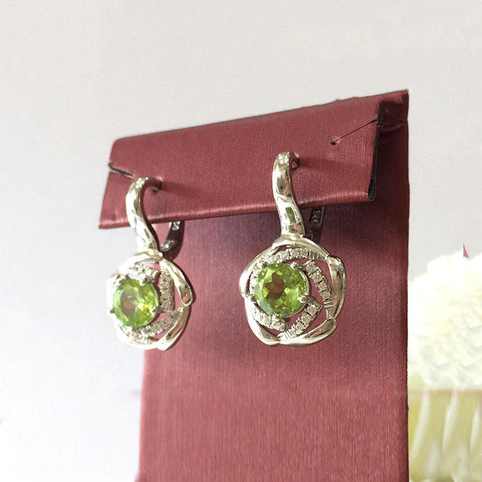 Peridot ring & earrings in high-quality silver are ready available at Nafisa Designs