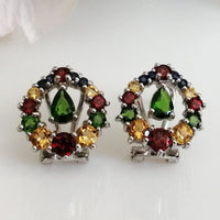 
Studs with emerald, blue sapphire, citrine and garnet in high quality silver ready available at Nafisa Designs, Manchester UK. Free Global Shipping!
For Inquiries Call or WhatsApp: +447878581702 OR +96567725075     