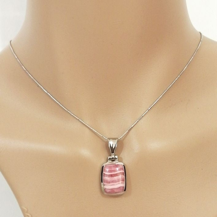 Rhodochrosite Pendant in high-quality silver ready available at Nafisa Designs, Manchester UK. Free Global Shipping!
For Inquiries Call or WhatsApp: +447878581702 OR +96567725075
