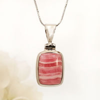 Rhodochrosite Pendant in high-quality silver ready available at Nafisa Designs