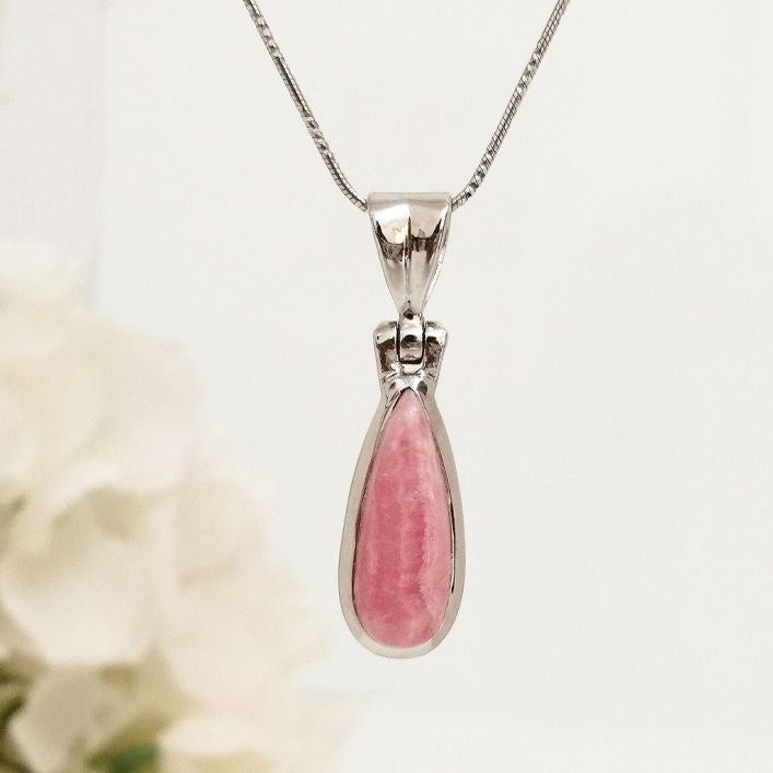 Rhodochrosite pendant in high quality silver ready available at Nafisa Designs