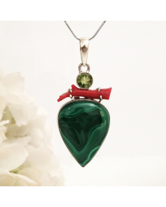 Pine green pendant with malachite, peridot & Coral in high quality silver ready available at Nafisa Designs, Manchester UK. Free Global Shipping!
For Inquiries Call or WhatsApp: +447878581702 OR +96567725075